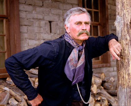 Charlton as Henry Hooker in TOMBSTONE.